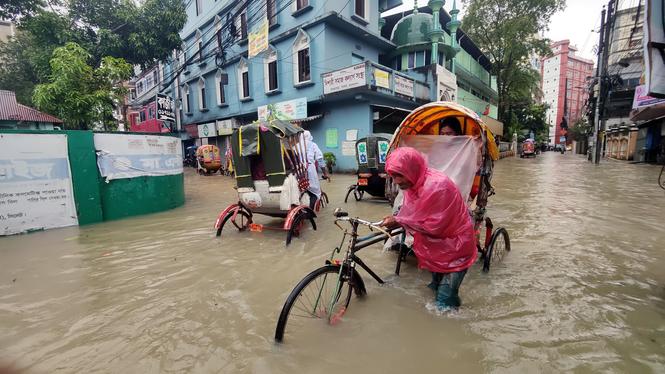 Extremväder är en av de saker som världsledarna oroar sig för. Bild från Bangladesh i maj förra året, då kustområdena drabbades av ovanligt mycket nederbörd på grund av klimatförändringarna.